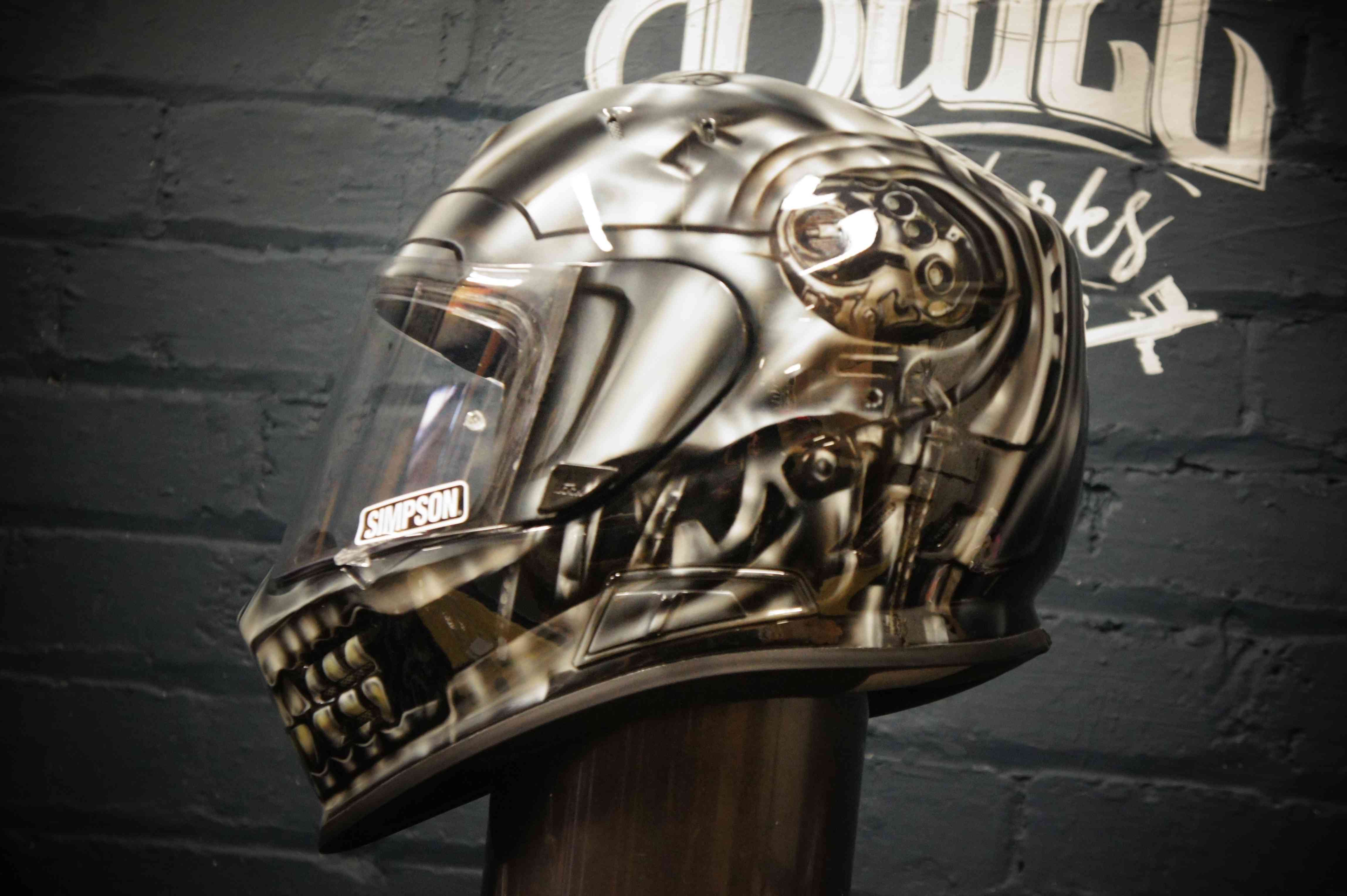 Photorealistic chrome skull motorcycle helmet with metallic silver finish, detailed skeletal features, jaw and eye sockets