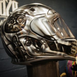 Chrome metallic skull motorcycle helmet with robotic endoskeleton jaw, glowing red eyes and hyper-realistic 3D airbrush effects